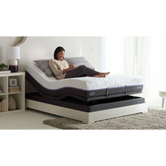 Image of Ultramatic Supreme Pillow Tilt Bed with a lady resting on gel mattress